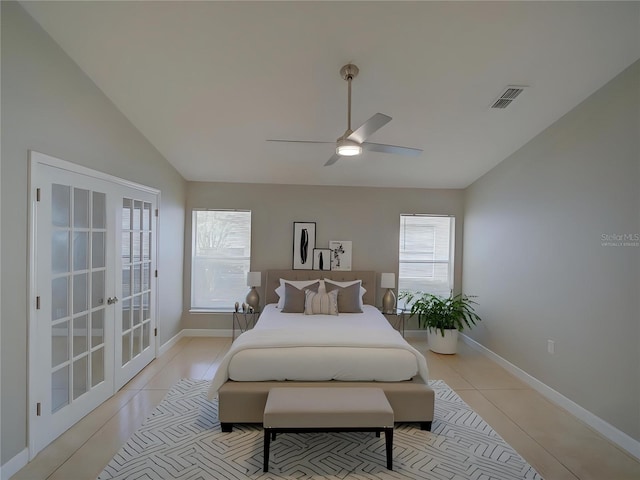 879 Nonastone Run, Casselberry, FL 32707 - bedroom featuring multiple windows, vaulted ceiling, french doors, light tile patterned floors, and baseboards