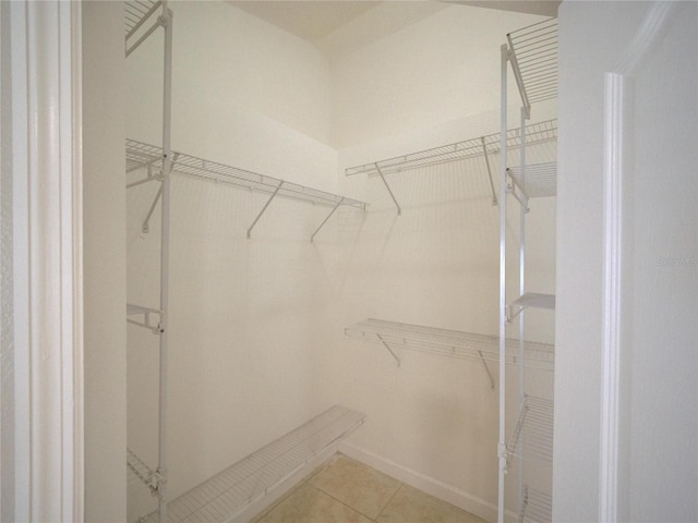 879 Nonastone Run, Casselberry, FL 32707 - spacious closet featuring tile patterned floors