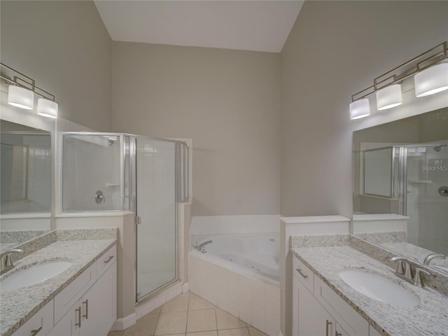 879 Nonastone Run, Casselberry, FL 32707 - bathroom with a shower stall, two vanities, tile patterned floors, and a tub with jets