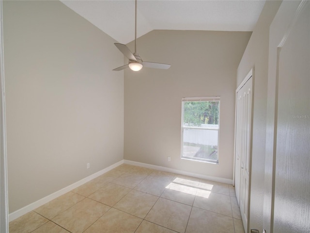 879 Nonastone Run, Casselberry, FL 32707 - spare room featuring ceiling fan, light tile patterned flooring, baseboards, and high vaulted ceiling
