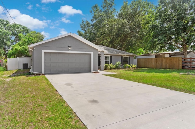 122 Seville Rd, Auburndale, FL 33823 - ranch-style home with a garage, concrete driveway, stucco siding, and central AC