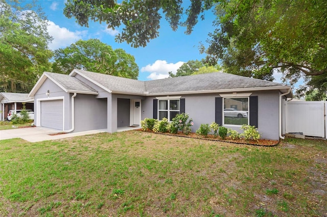 122 Seville Rd, Auburndale, FL 33823 - single story home featuring an attached garage, concrete driveway, and stucco siding