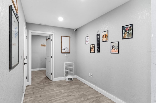 122 Seville Rd, Auburndale, FL 33823 - hallway with light wood-style flooring, baseboards, and recessed lighting