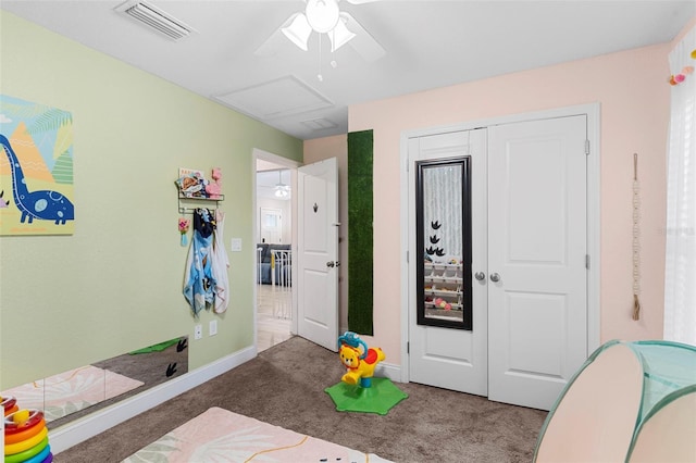 122 Seville Rd, Auburndale, FL 33823 - bedroom with carpet flooring, baseboards, a closet, ceiling fan, and attic access