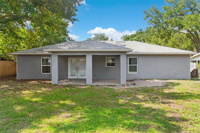 122 Seville Rd, Auburndale, FL 33823 - rear view of property with french doors, stucco siding, a patio, and a shingled roof