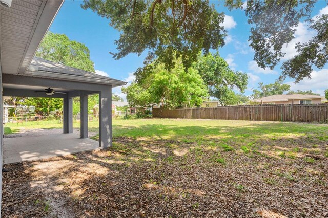 122 Seville Rd, Auburndale, FL 33823 - view of yard featuring ceiling fan and a patio area
