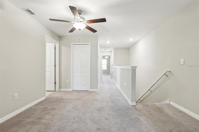 11632 Castine St, New Port Richey, FL 34654 - spare room featuring carpet floors, ceiling fan, and baseboards