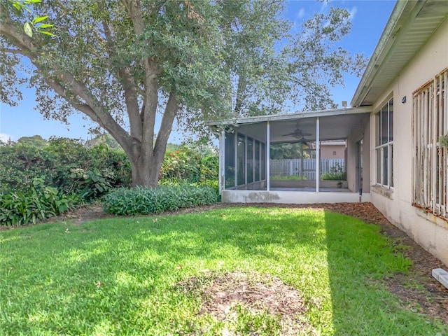 1131 Turtle Lake Ct, Ocoee, FL 34761 - view of grassy yard featuring a sunroom and a ceiling fan