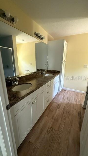 30965 E Thyme Ave, Eustis, FL 32736 - full bath with wood finished floors and double vanity