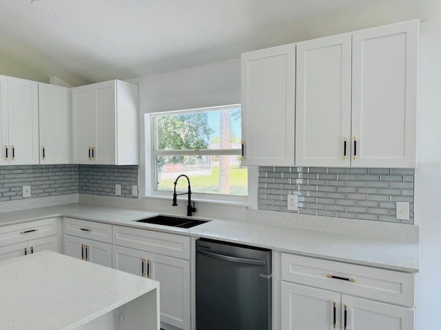 215 Hollowbrook Cir, Daytona Beach, FL 32114 - kitchen with dishwasher, a sink, backsplash, and white cabinets