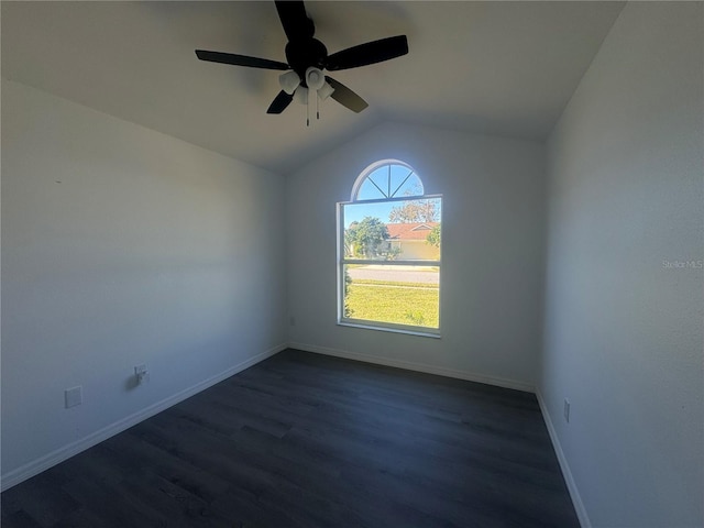 215 Hollowbrook Cir, Daytona Beach, FL 32114 - unfurnished room featuring lofted ceiling, dark wood-style floors, a ceiling fan, and baseboards