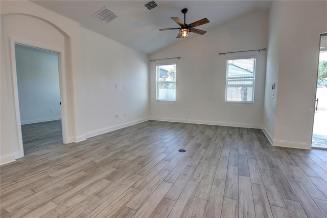 1727 Butterfly Way, Longwood, FL 32750 - unfurnished room with ceiling fan, vaulted ceiling, wood finished floors, and baseboards