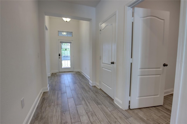 1727 Butterfly Way, Longwood, FL 32750 - entrance foyer featuring light wood-type flooring and baseboards