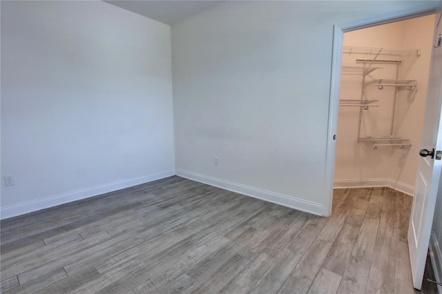 1727 Butterfly Way, Longwood, FL 32750 - spare room featuring wood finished floors and baseboards