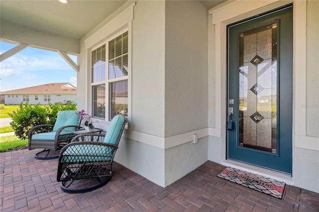 2793 Nature View Rd, Saint Cloud, FL 34771 - property entrance with stucco siding