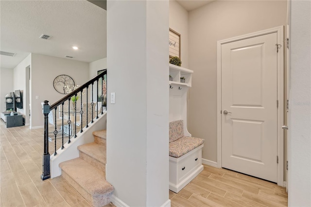 2793 Nature View Rd, Saint Cloud, FL 34771 - mudroom featuring light wood-style floors and baseboards