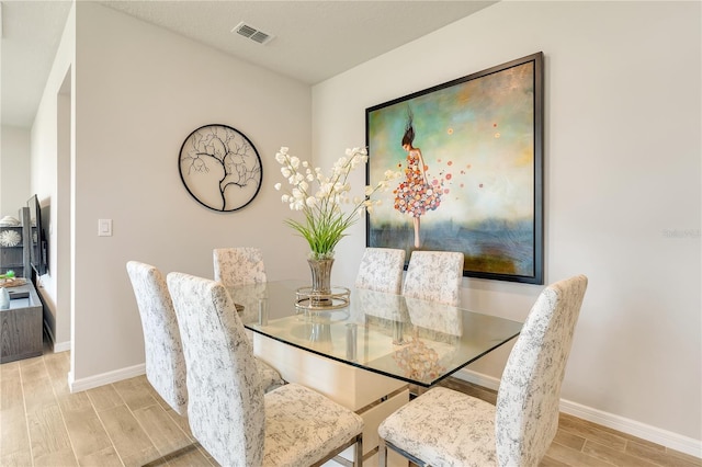 2793 Nature View Rd, Saint Cloud, FL 34771 - dining room featuring wood finished floors and baseboards