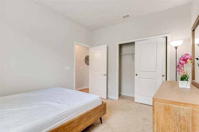 2793 Nature View Rd, Saint Cloud, FL 34771 - bedroom featuring light carpet, a closet, and baseboards