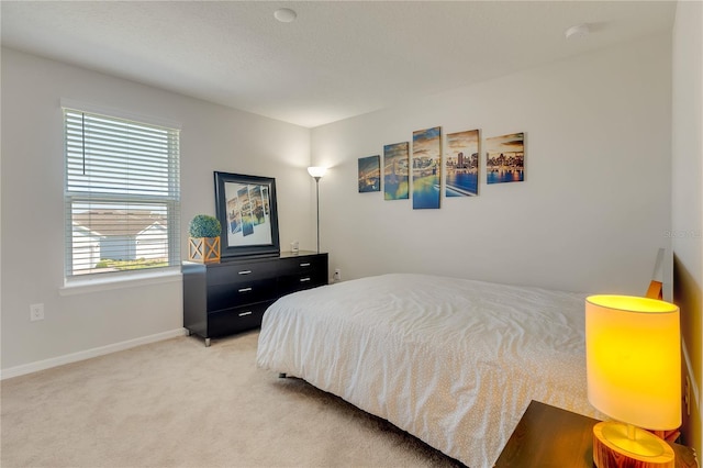 2793 Nature View Rd, Saint Cloud, FL 34771 - bedroom featuring light carpet and baseboards