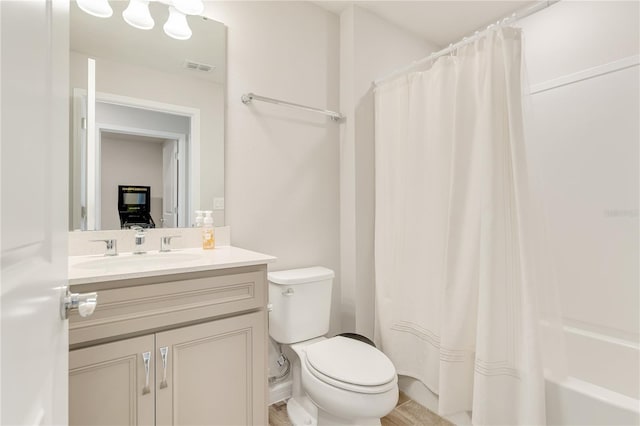 2793 Nature View Rd, Saint Cloud, FL 34771 - full bathroom featuring vanity, toilet, and shower / bath combination with curtain
