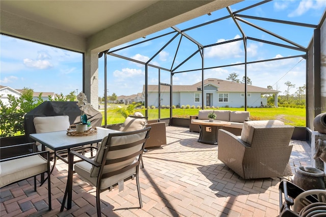2793 Nature View Rd, Saint Cloud, FL 34771 - view of patio featuring an outdoor living space, a residential view, glass enclosure, and outdoor dining area