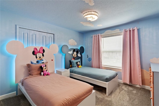 4184 Paragraph Dr, Kissimmee, FL 34746 - carpeted bedroom with a textured ceiling and baseboards
