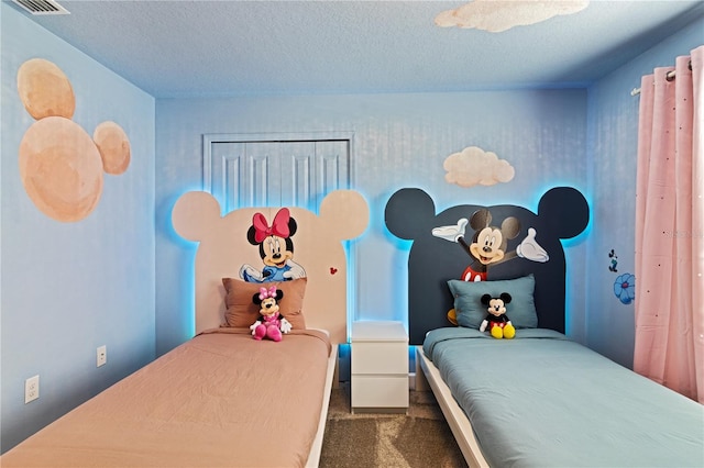 4184 Paragraph Dr, Kissimmee, FL 34746 - bedroom featuring carpet flooring and a textured ceiling