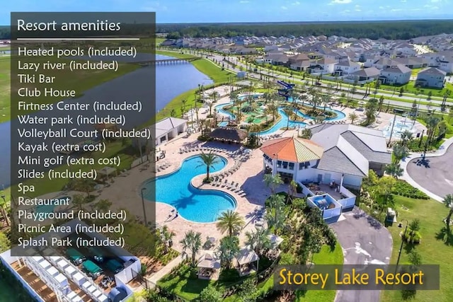 4184 Paragraph Dr, Kissimmee, FL 34746 - drone / aerial view of a pool area and a large body of water