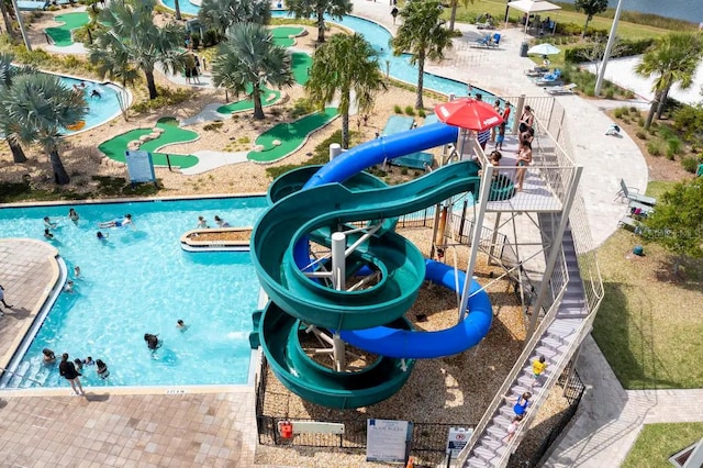 4184 Paragraph Dr, Kissimmee, FL 34746 - community pool featuring a water slide