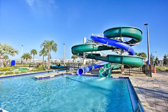 4184 Paragraph Dr, Kissimmee, FL 34746 - community pool featuring a water slide