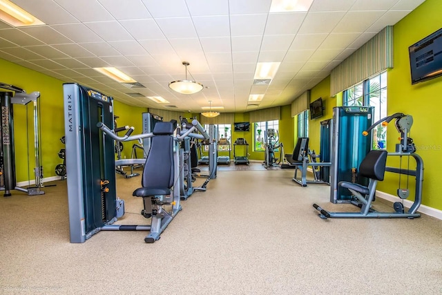 4184 Paragraph Dr, Kissimmee, FL 34746 - workout area featuring baseboards