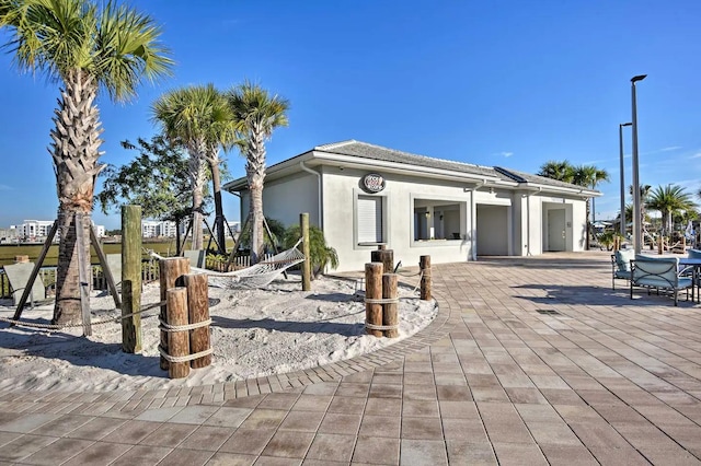 4184 Paragraph Dr, Kissimmee, FL 34746 - back of property featuring stucco siding