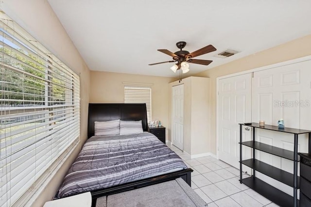 2822 Fulford St, Deltona, FL 32738 - bedroom featuring light tile patterned floors and a ceiling fan