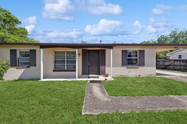 2822 Fulford St, Deltona, FL 32738 - ranch-style house featuring concrete block siding