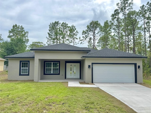 628 W Heronsbill Ln, Dunnellon, FL 34434 - view of front of property featuring a garage, stucco siding, driveway, and a shingled roof