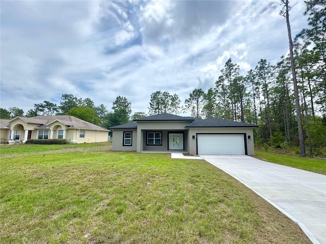 628 W Heronsbill Ln, Dunnellon, FL 34434 - view of front of house featuring a garage, concrete driveway, stucco siding, and a front yard