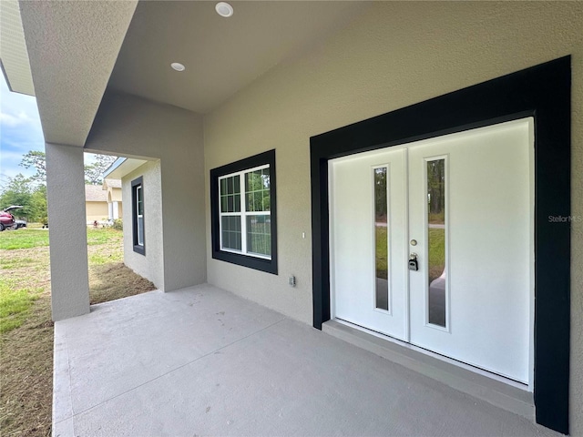 628 W Heronsbill Ln, Dunnellon, FL 34434 - view of patio / terrace featuring french doors