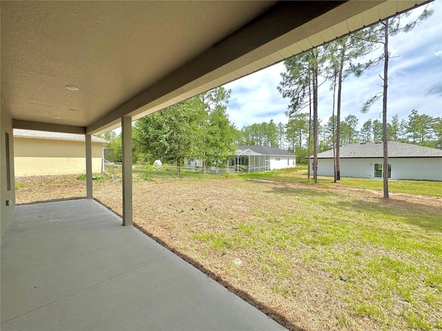 628 W Heronsbill Ln, Dunnellon, FL 34434 - view of green lawn with a patio area