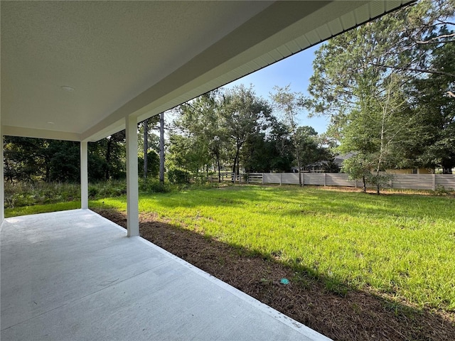 628 W Heronsbill Ln, Dunnellon, FL 34434 - view of patio / terrace featuring view of wooded area