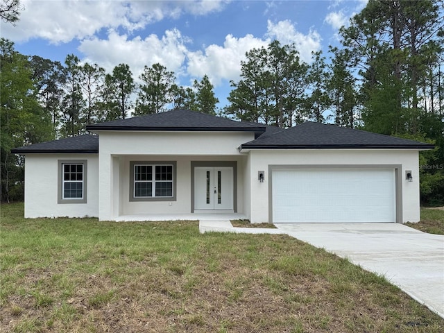 2523 W Andromedae Dr, Citrus Springs, FL 34433 - view of front of home featuring driveway, an attached garage, a front lawn, stucco siding, and french doors