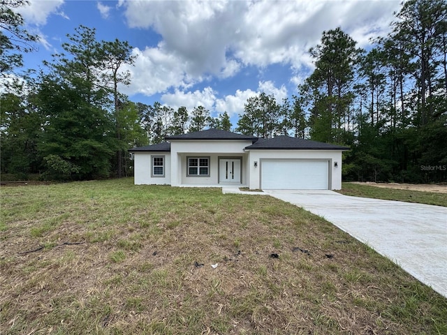 2523 W Andromedae Dr, Citrus Springs, FL 34433 - view of front of home featuring stucco siding, an attached garage, driveway, and a front lawn