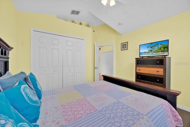 2627 Autumn Creek Cir, Kissimmee, FL 34747 - carpeted bedroom with a closet, vaulted ceiling, ceiling fan, and baseboards