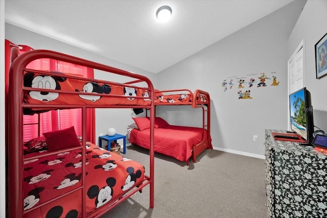 2627 Autumn Creek Cir, Kissimmee, FL 34747 - bedroom with carpet flooring, baseboards, and vaulted ceiling