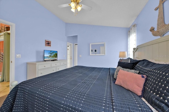 2627 Autumn Creek Cir, Kissimmee, FL 34747 - bedroom with lofted ceiling, ceiling fan, and tile patterned floors