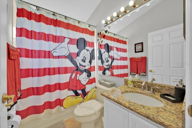 2627 Autumn Creek Cir, Kissimmee, FL 34747 - bathroom with toilet, vanity, vaulted ceiling, and shower / bath combo
