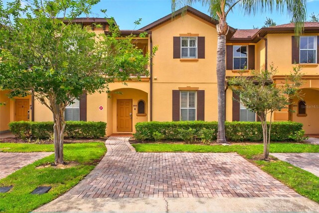 3725 Calabria Ave, Davenport, FL 33897 - view of property with stucco siding