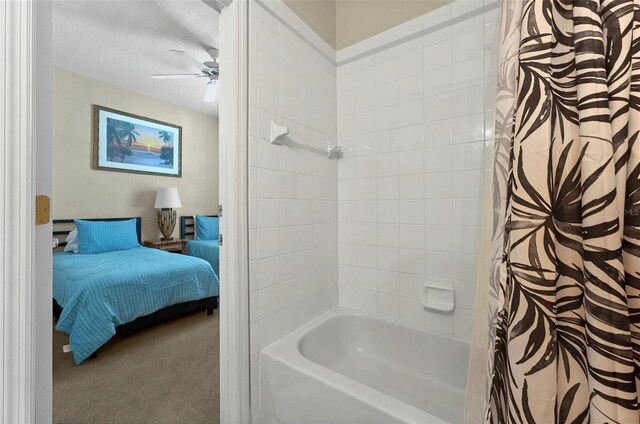 3725 Calabria Ave, Davenport, FL 33897 - ensuite bathroom with shower / bathtub combination with curtain and a ceiling fan