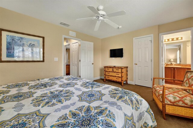 3725 Calabria Ave, Davenport, FL 33897 - bedroom featuring carpet flooring, baseboards, ceiling fan, and connected bathroom