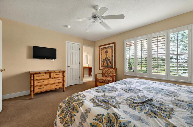 3725 Calabria Ave, Davenport, FL 33897 - bedroom featuring baseboards, multiple windows, carpet flooring, a ceiling fan, and a textured ceiling
