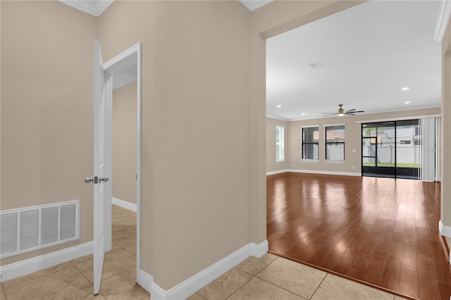 8348 Vivaro Isle Way, Windermere, FL 34786 - unfurnished living room featuring baseboards, a ceiling fan, ornamental molding, recessed lighting, and light wood-style flooring